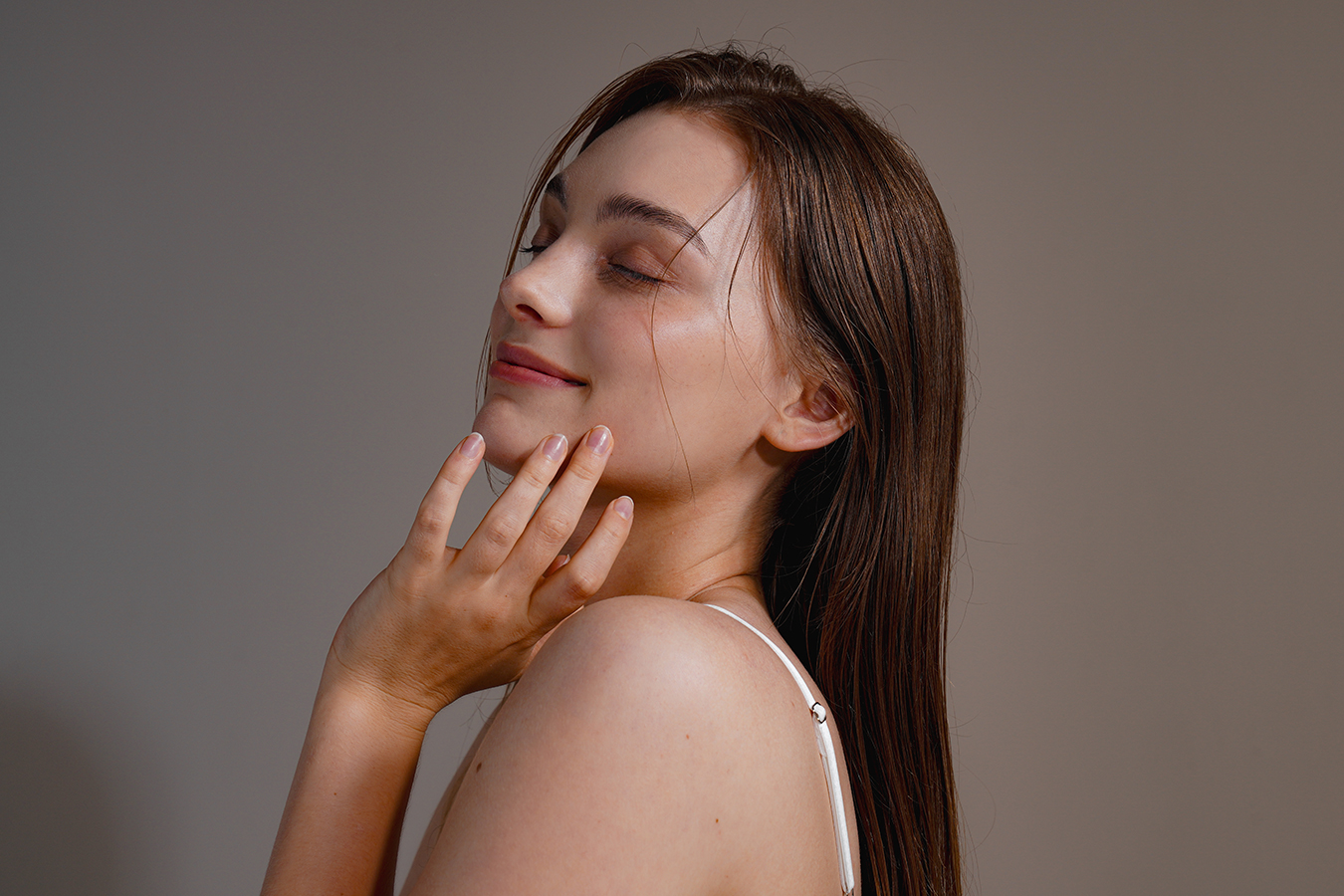 Woman posing for facial fillers and injectables cost information