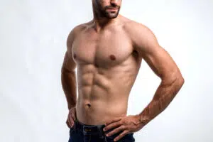 Shirtless man representing gynecomastia treatment and male chest contouring in Boston.