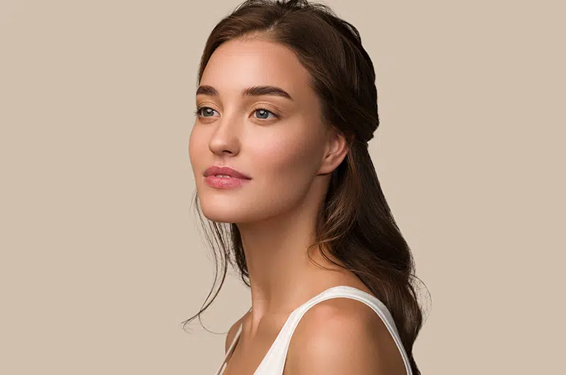 Woman with smooth, radiant skin after PICOSure laser treatment in Boston, ideal for all skin tones.