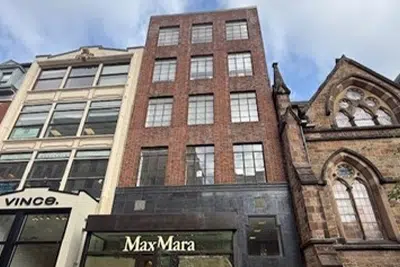 Exterior view of Dr. Sean Doherty’s Boston office building with MaxMara storefront at street level