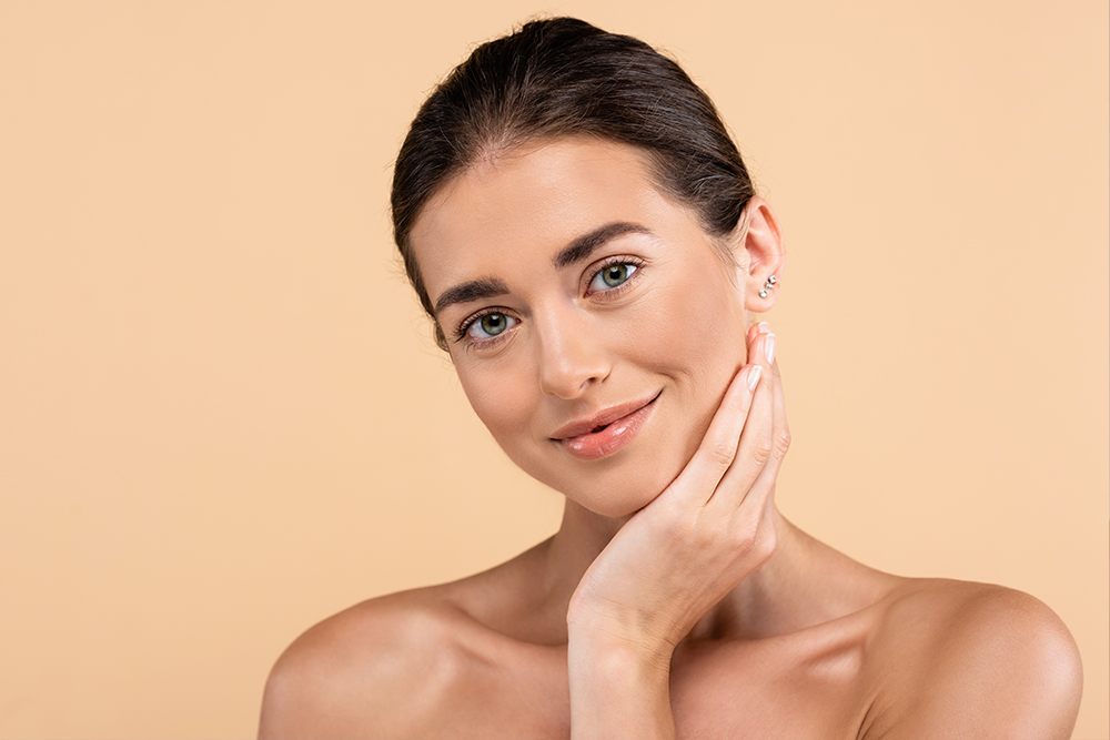 Woman with clear, radiant skin representing professional skin care treatments in Boston, MA.